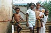 Children standing with yard tap - Durban South Africa