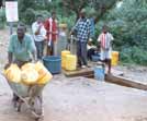 Collecting water from communal standpipe in KwaZulu-Natal