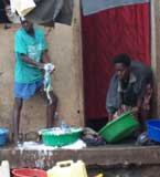 People washing clothes in Kampala