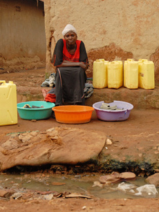 Lady Washing in Uganda