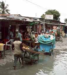 Image of street in Dar es Salaam with small water tanker