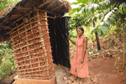 Woman by Latrine